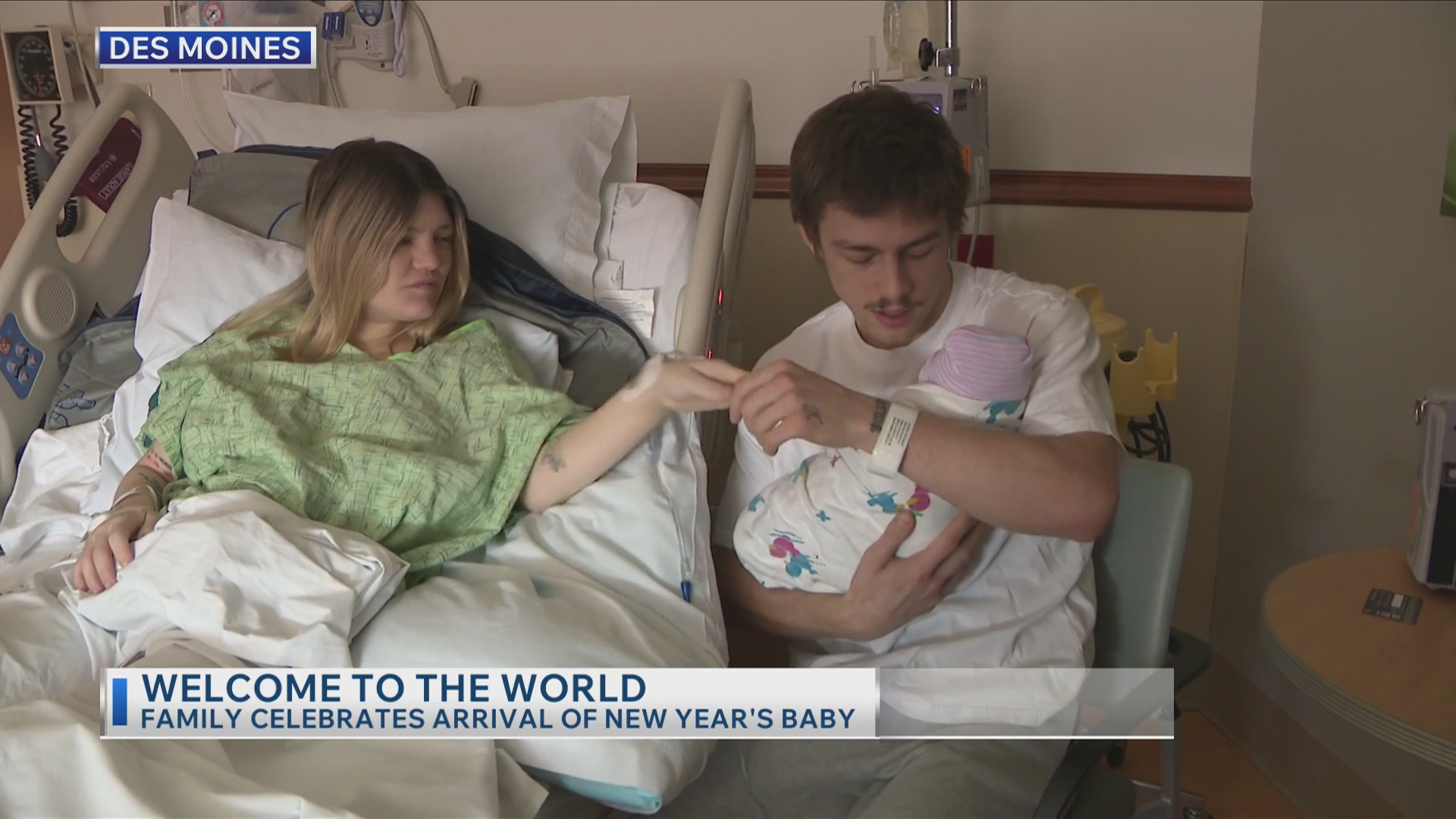 Family celebrates arrival of New Year's baby