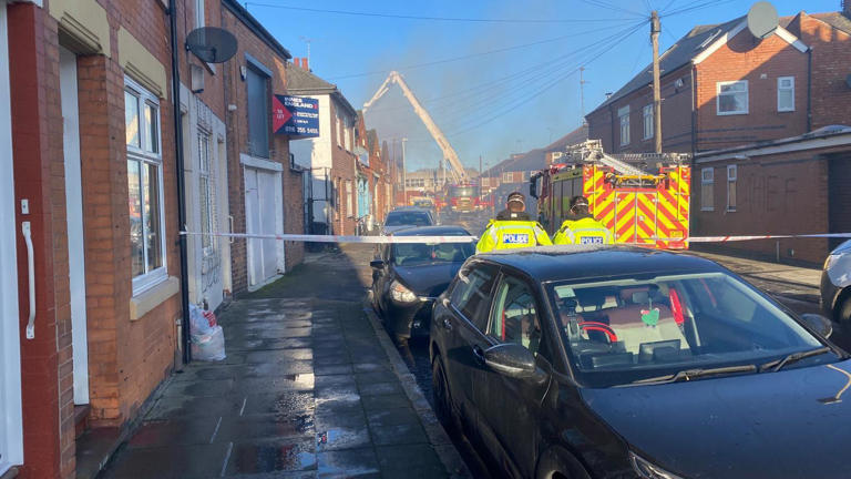 Building partially collapses after shop fire