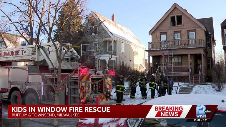 Two children hanging from attic window rescued in Milwaukee house fire