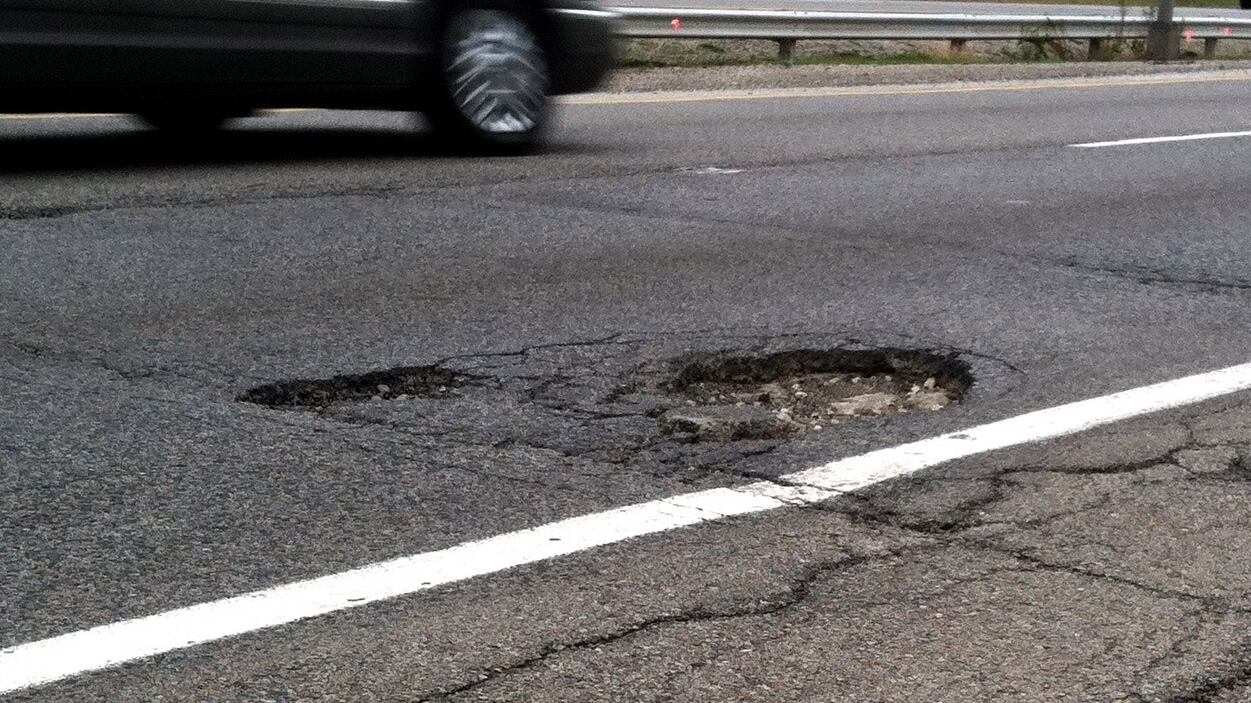 Michigan drivers face early pothole season as freeze, thaw cycle continues