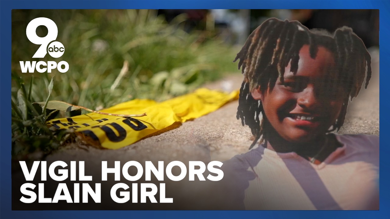 Community holds vigil where 11-year-old girl was shot and killed