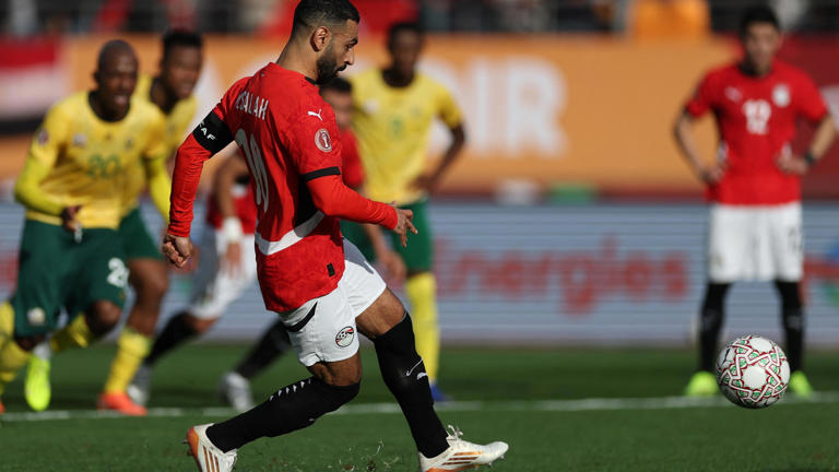 Mohamed Salah's Panenka penalty gave 10-man Egypt a gritty win over South Africa in their second group game