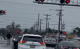Train collides with car at crossing in California