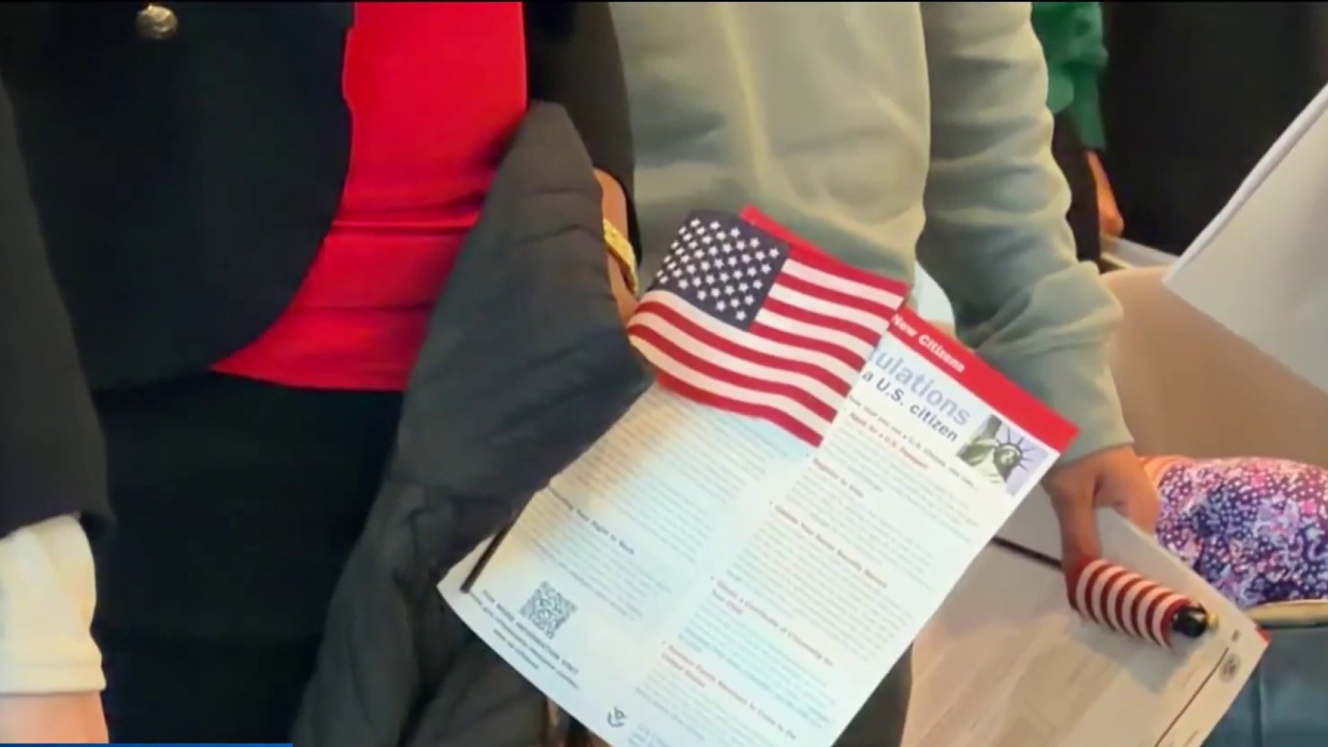 Immigrants sue federal government over pause in processing cases