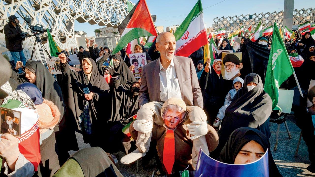 Trump, top Iranian official trade threats as protests grip Iran
