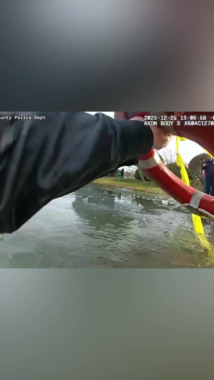 Hero cop crawls across ice to save 8-year-old stuck in frozen pond