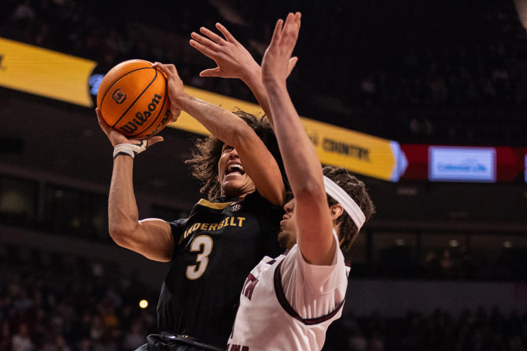 No. 11 Vanderbilt keeps undefeated season alive with 83-71 victory over ...