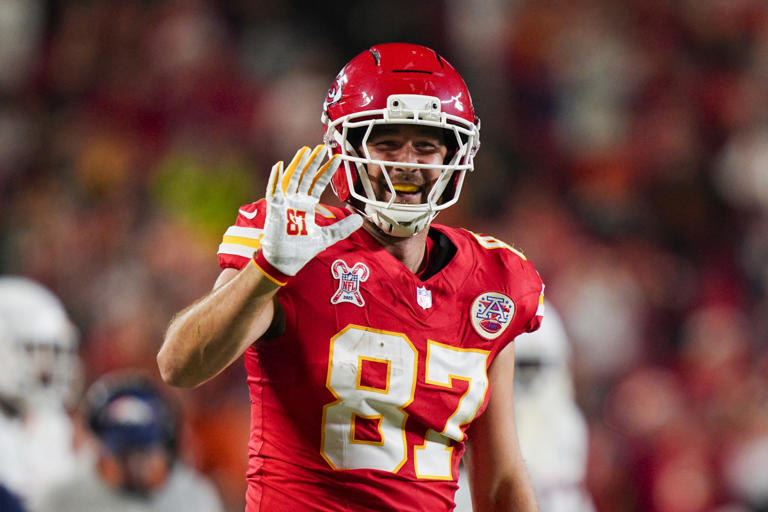 Kansas City Chiefs tight end Travis Kelce (87) reacts after making a catch for a first down during the first half against the Denver Broncos. Jay Biggerstaff-Imagn Images