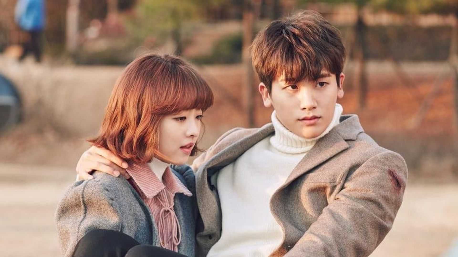 Park Bo-Young carrying her love interest in a bridal hold in the K-drama Strong Girl Bong-Soon.
