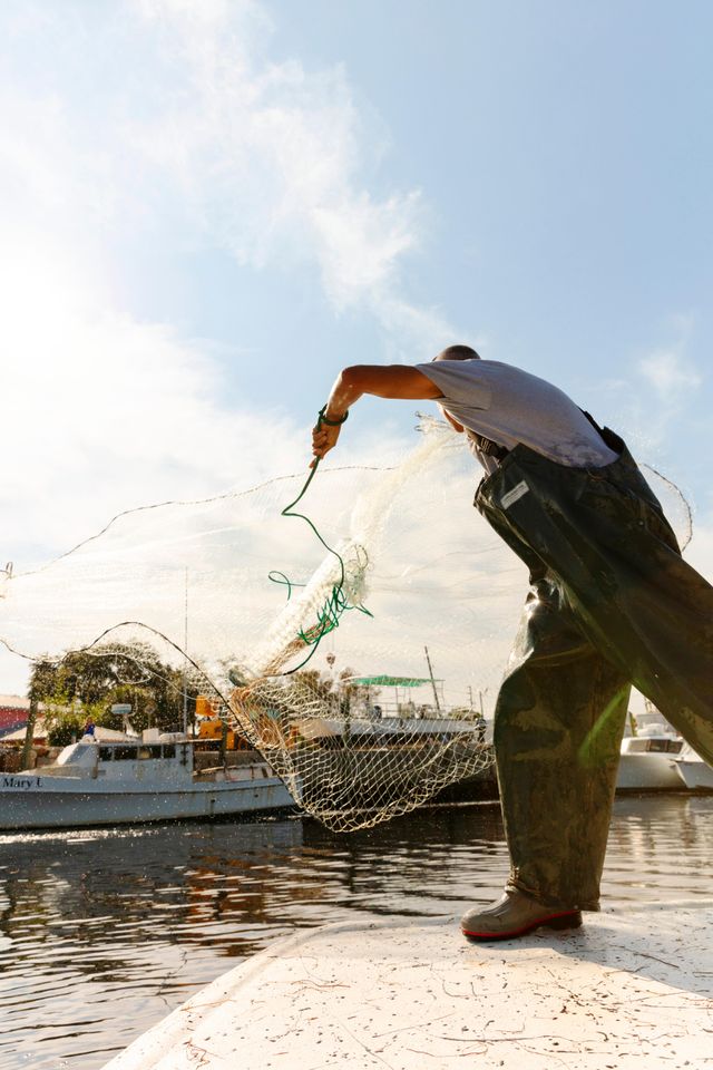 Fisherman Jake Dean dropping off mullet at Pelican Point Seafood/Rusty Bellies