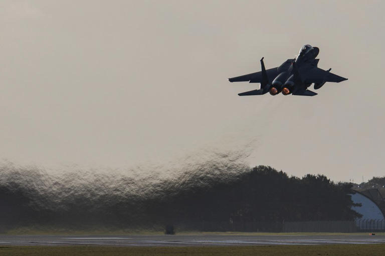 Chinese national arrested for photographing US military aircraft: DOJ