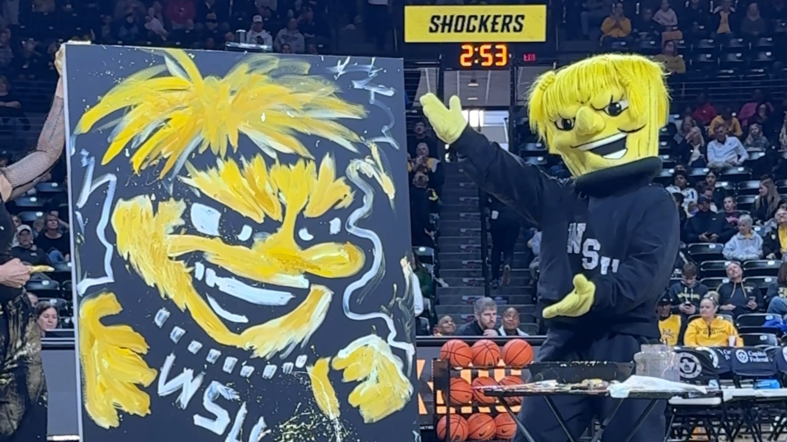 Speed painter wows crowd during Wichita State halftime show<br><br>