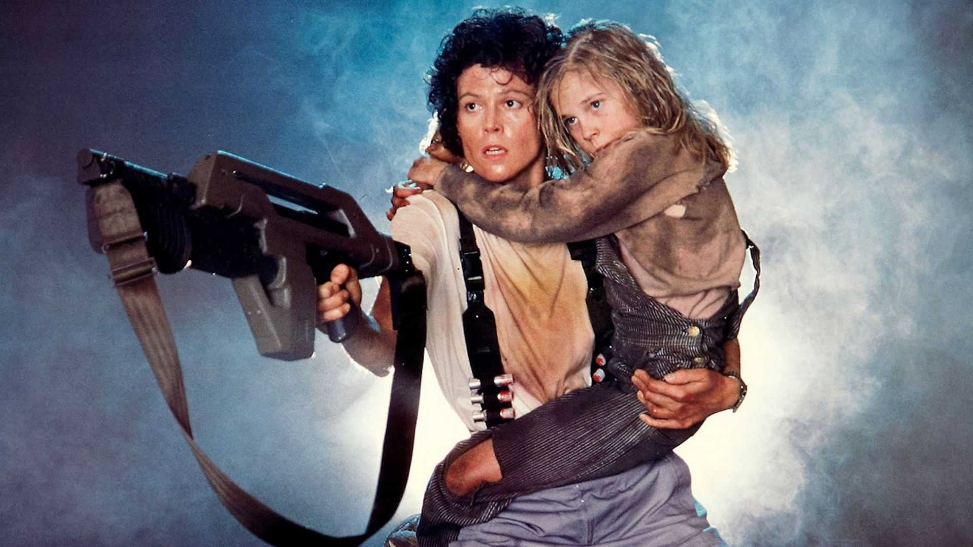 Sigourney Weaver as Ripley with a big gun in Aliens