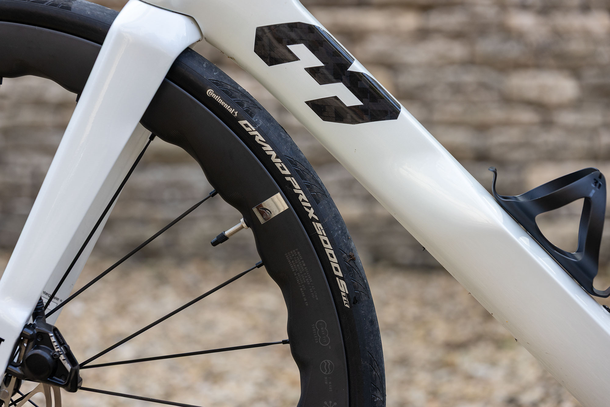 Image taken side on showing clearance between downtube and Continental GP 5000 tyres