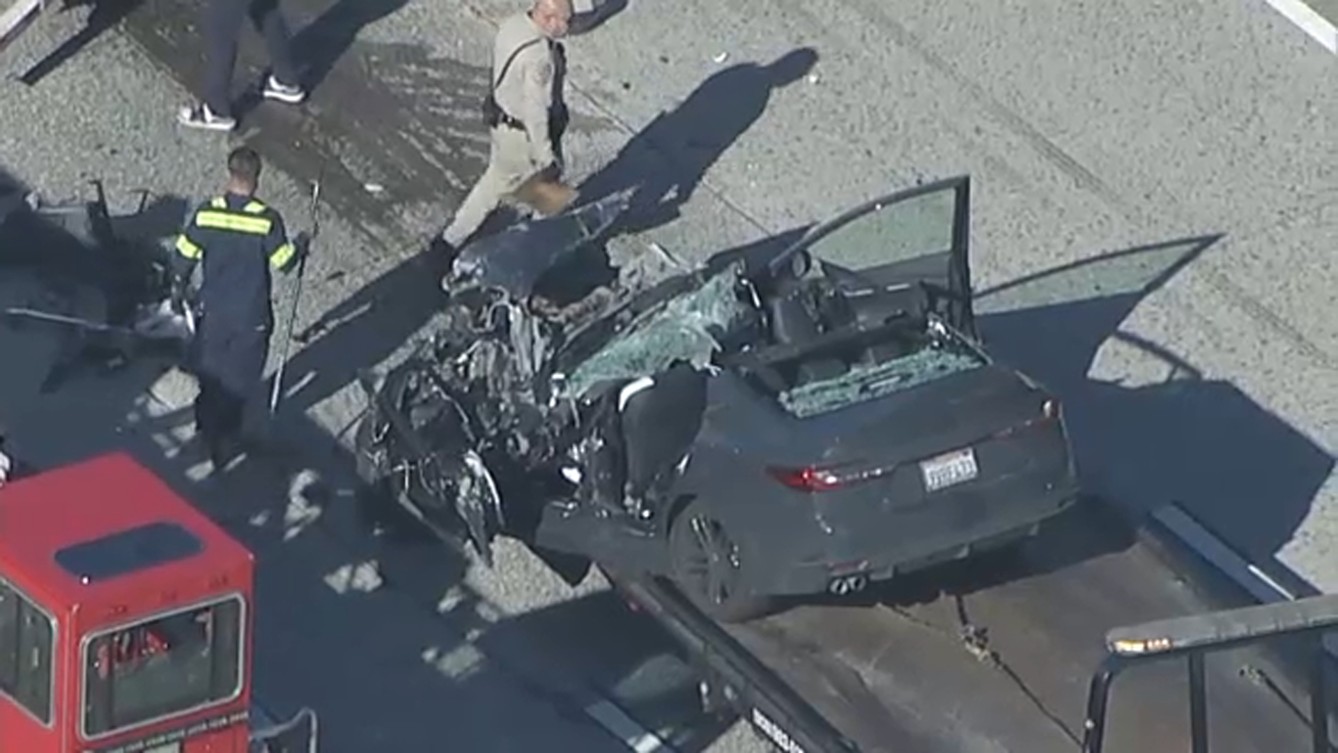 Driver extricated after crashing under semi on 210 Freeway in San Dimas
