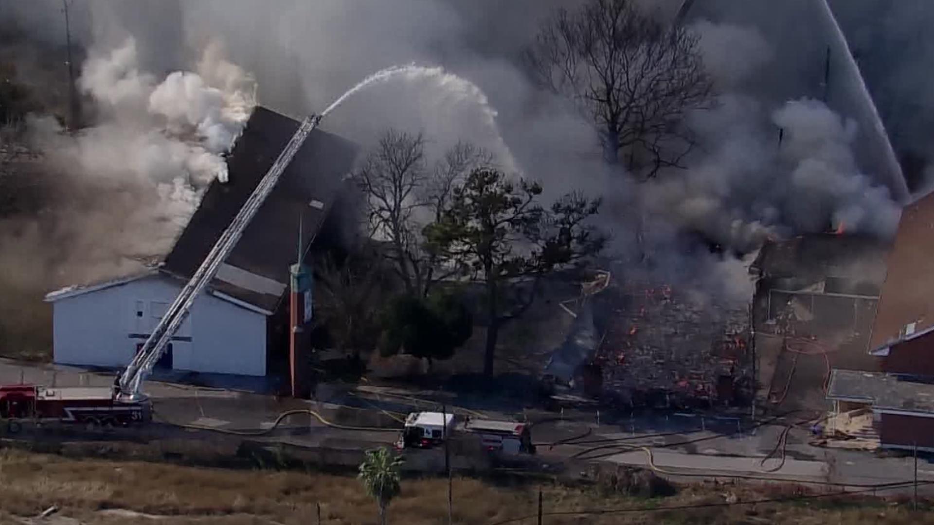 Three-alarm fire rips through former church buildings in north Houston