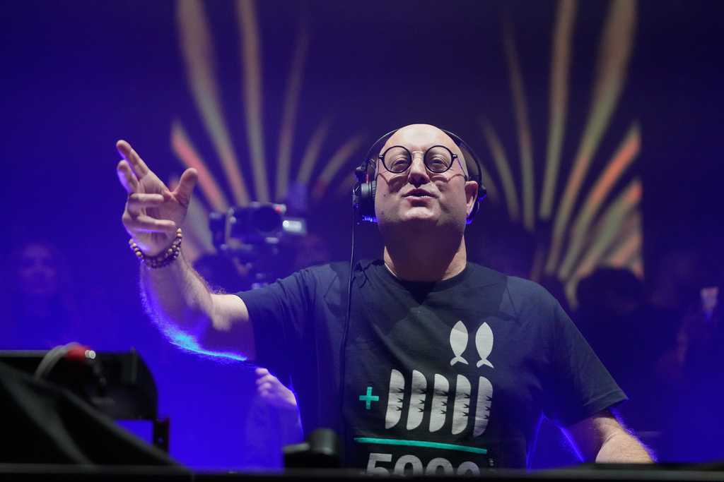Priest by day, DJ by night: A padre's rave draws cheers and controversy