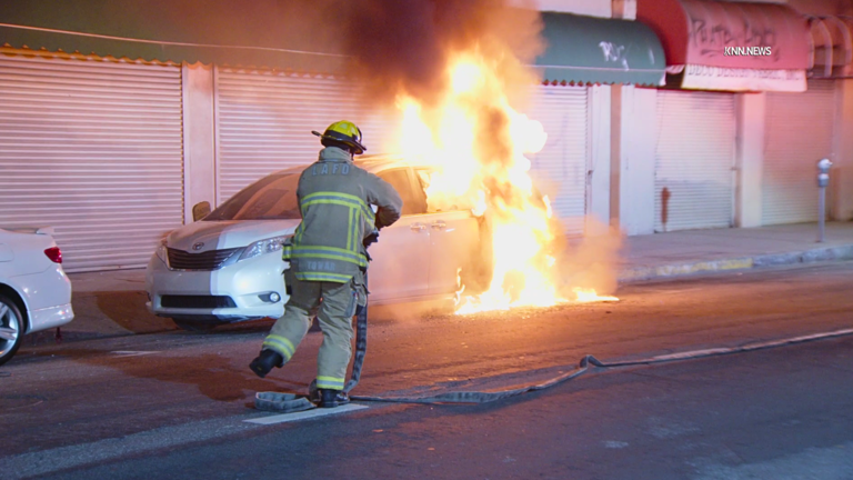 Masked suspect seen on video torching minivan outside Los Angeles ...