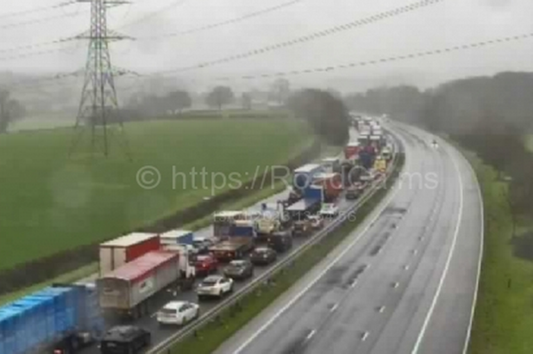 Part of M5 closed after pedestrian killed in lorry crash