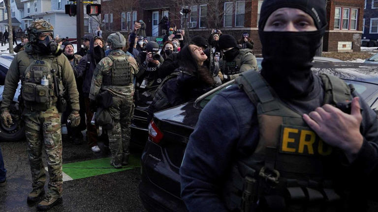Internet inflamed after ICE agents drag woman out of her car
