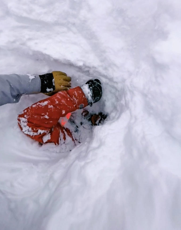 Pulse-pounding moment skier rescues man buried under avalanche after ...