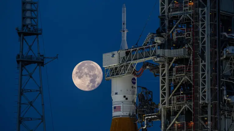 A full moon was visible behind the Artemis I SLS (Space Launch System) rocket and Orion spacecraft at Launch Complex 39B at NASA's Kennedy Space Center in Florida on June 14, 2022. The first in an increasingly complex series of missions, Artemis I tested SLS and Orion as an integrated system prior to crewed flights to the Moon. Fox News