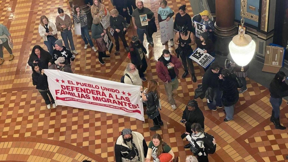 ICE protesters line up as at the Iowa State Capitol