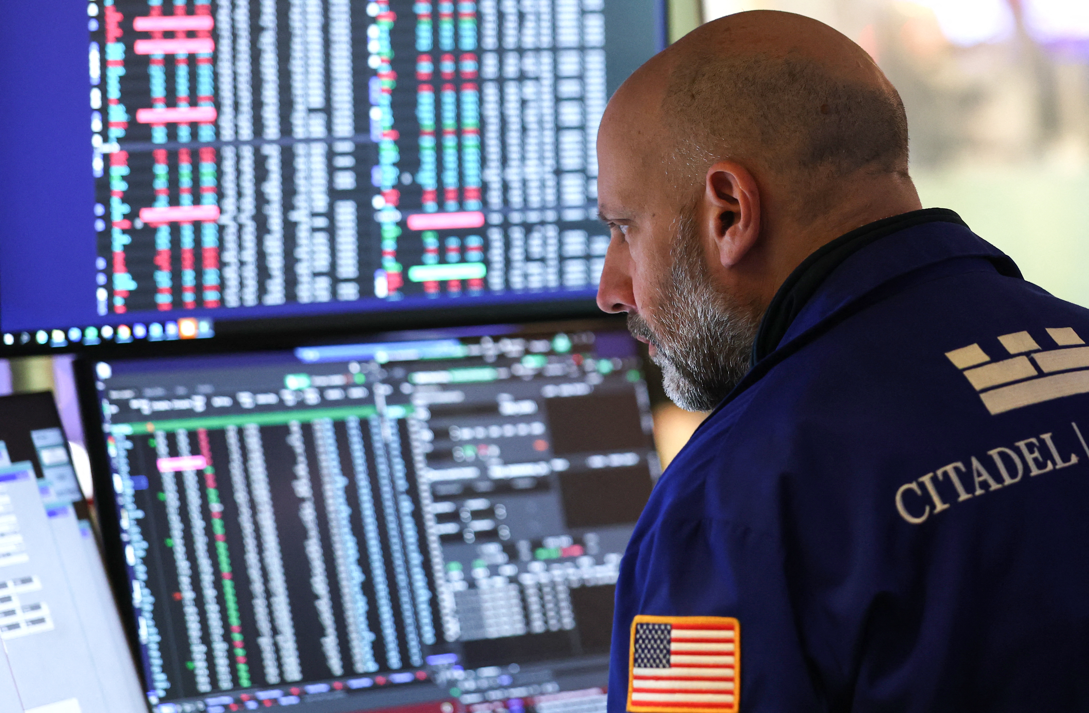 Stocks slide after Trump threatens new tariffs over Greenland