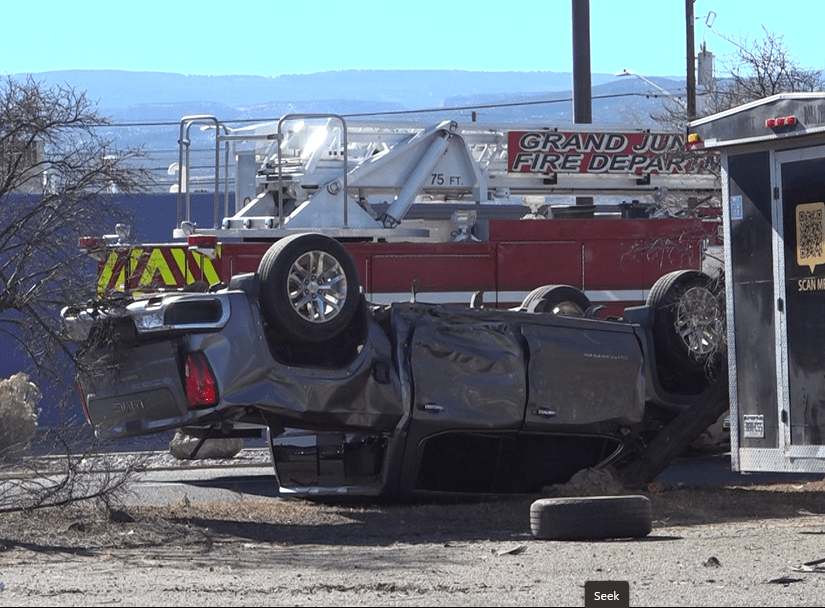 Rollover crash involving 2 vehicles partially closes intersection