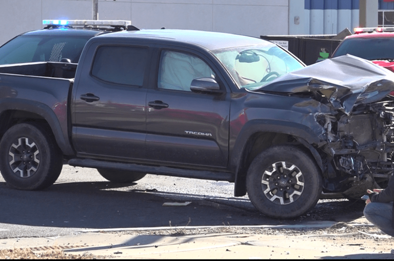 Rollover crash involving 2 vehicles partially closes intersection