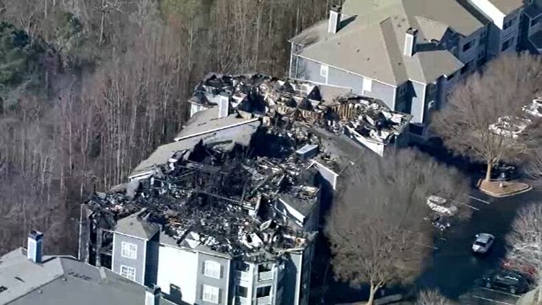 Multiple residents rescued from overnight fire at Gwinnett County ...