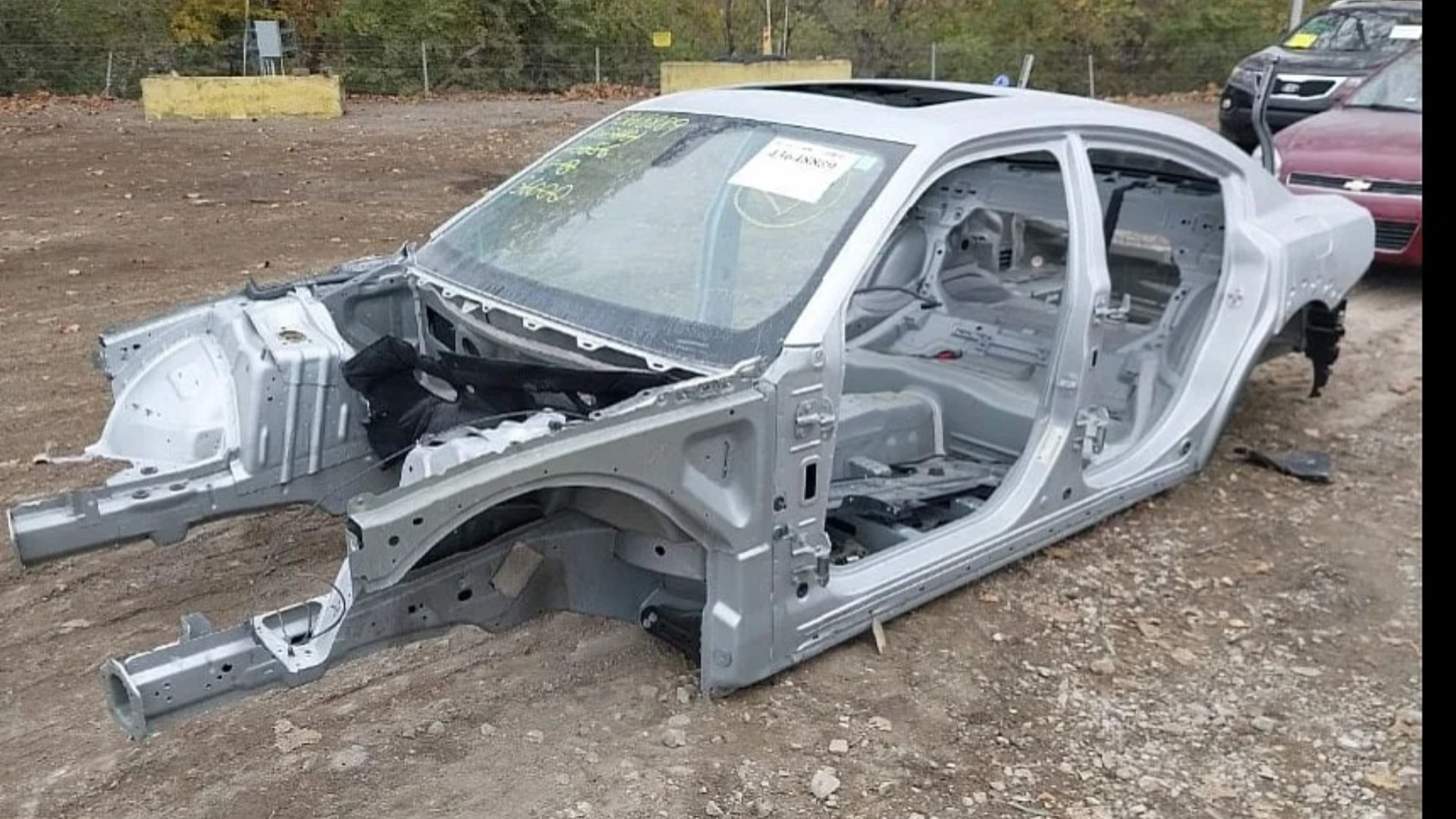 Stripped 2022 Dodge Charger SRT Hellcat heads to auction as empty shell