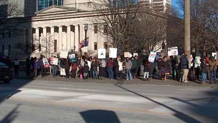 Protesters rally outside Ohio Statehouse against Trump policies on ...