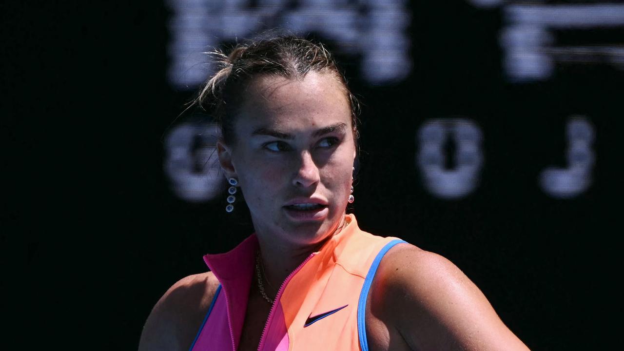 World No. 1 advances in imperfect display, Aussie bows out