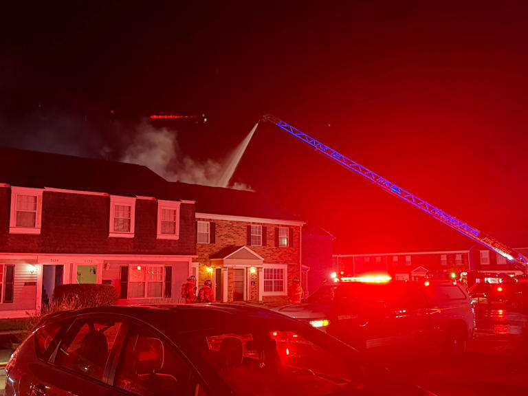 Dozens displaced after suspected kitchen fire spreads through apartment ...