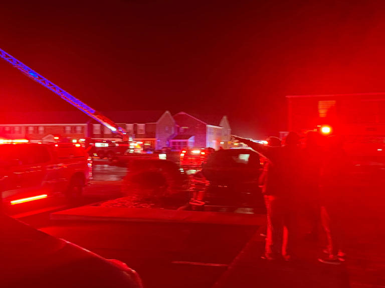 Dozens displaced after suspected kitchen fire spreads through apartment ...