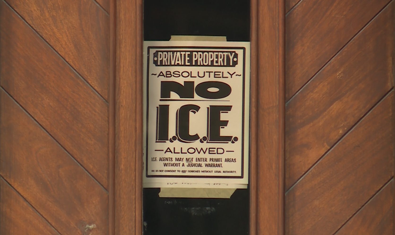 Maine businesses protesting ICE with poster made by local artist