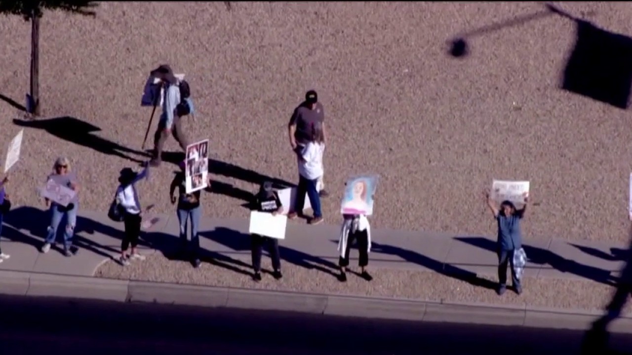 Arizona high school students walk out in protest