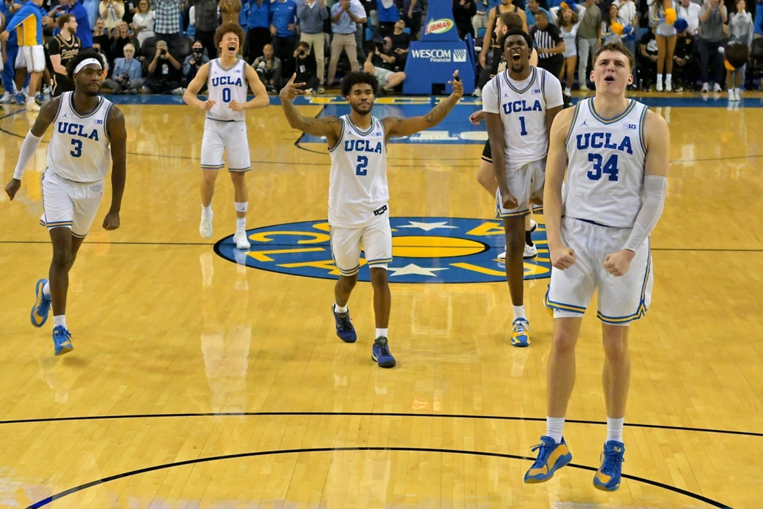 Top 25 roundup: UCLA stuns No. 4 Purdue with late trey
