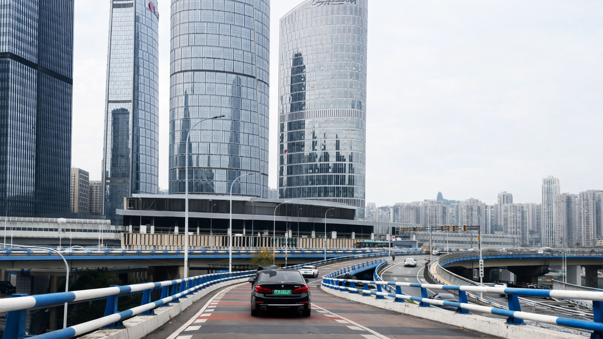 Glass towers surround this Chongqing highway