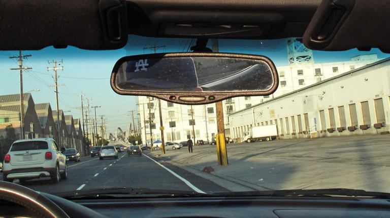 What's the tab on a car's rearview mirror for?