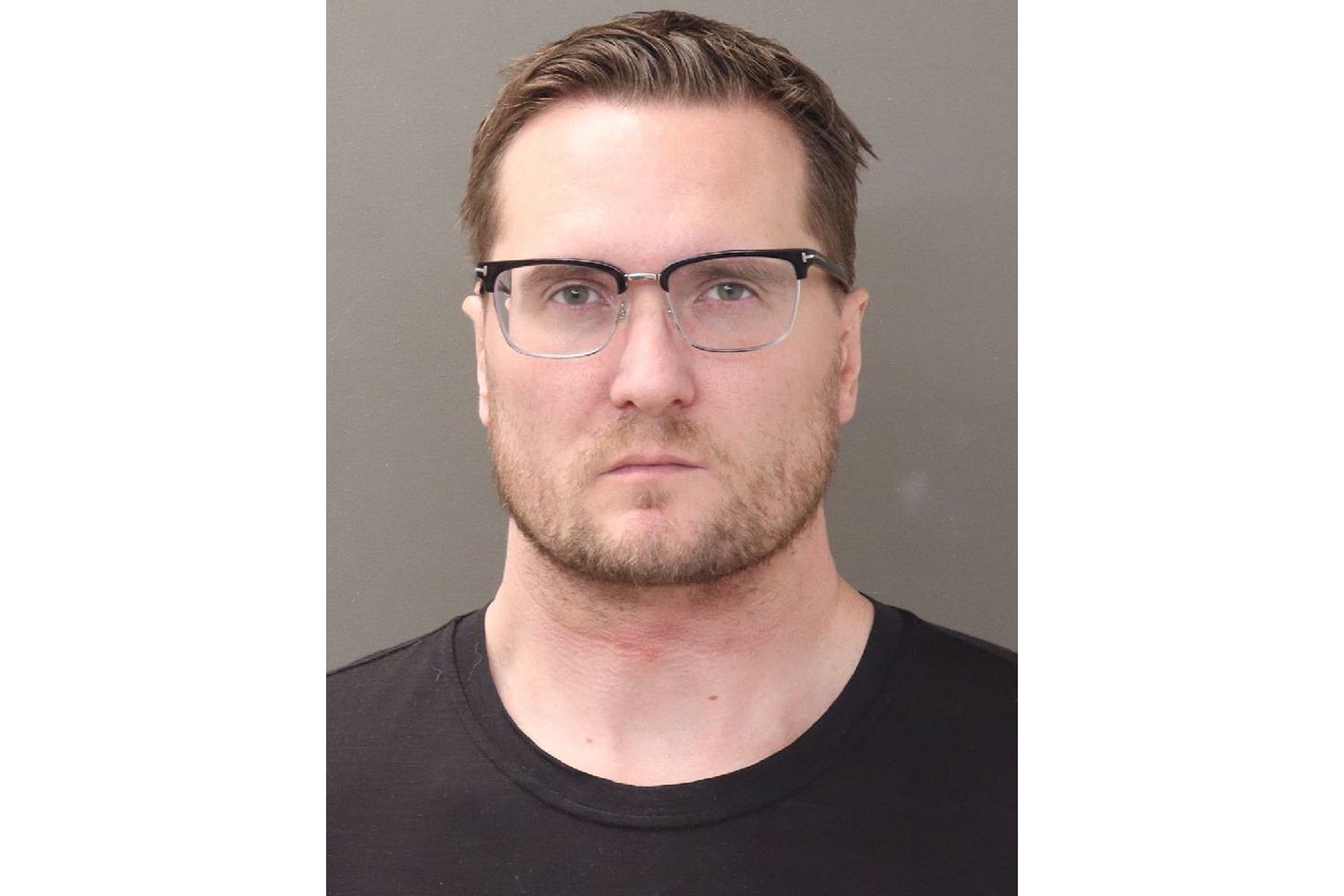 Surgeon charged in murder of ex-wife and dentist husband extradited to Ohio