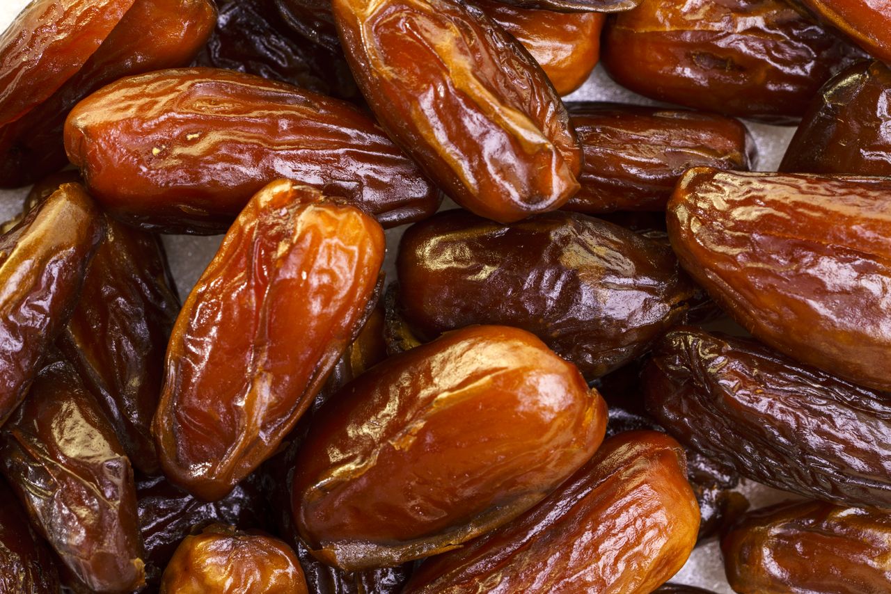 A closeup view of several dates placed together