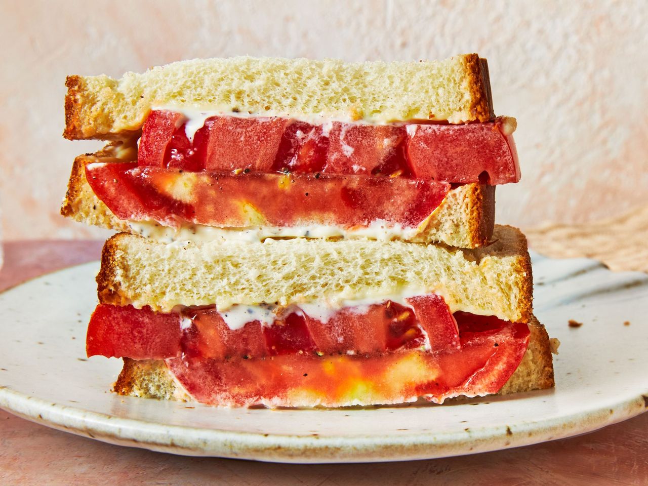 tomato sandwich halves stacked on top of one another