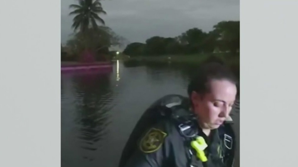 Deputy dives into Tamarac canal to save driver trapped in sinking car