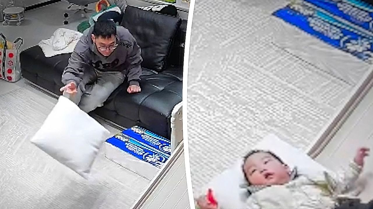 Nonchalant father saves toddler from hard fall out pure instinct
