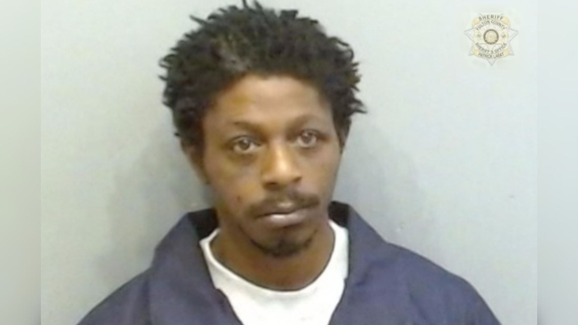 Atlanta officer hit by bullet while arresting DeKalb murder suspect
