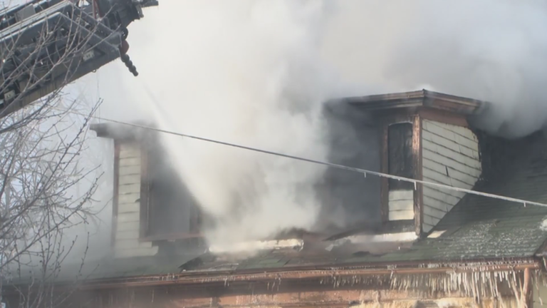 Firefighters battle flames in cold temperatures