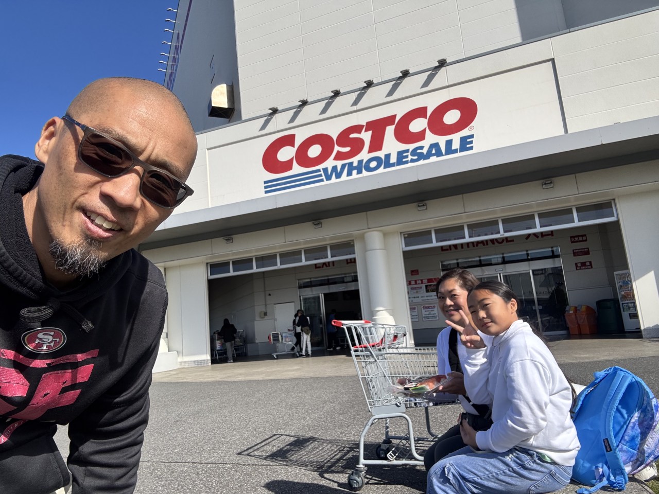 Joy Yip, with her husband and daughter at a Costco outside Tokyo, said the familiarity provides a sense of safety.