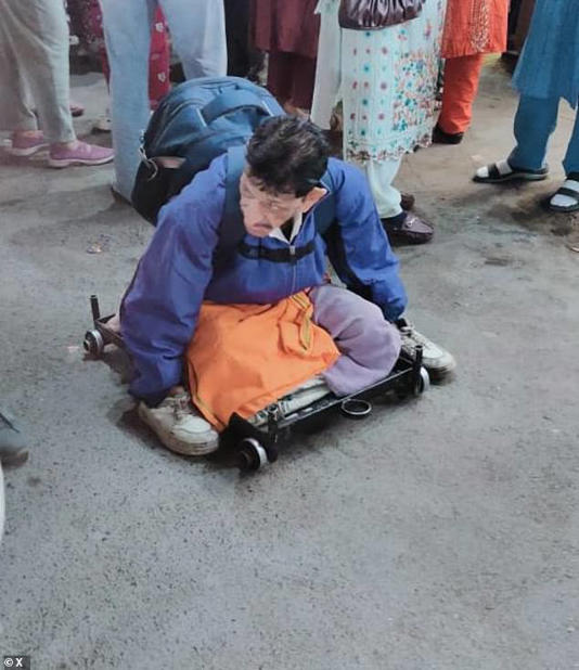 The 50-year-old man, known only as Mangilal, has been a familiar sight at the Sarafa Bazaar for years